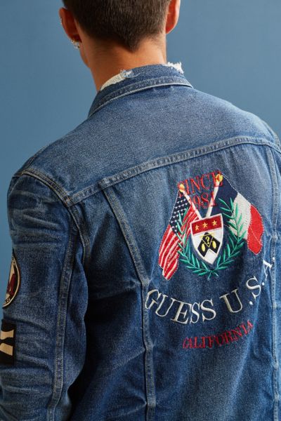 guess denim jacket logo on back