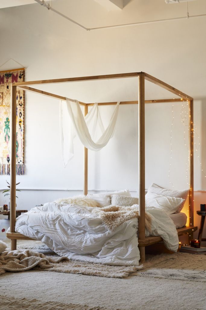 Eva Wooden Canopy Bed | Urban Outfitters