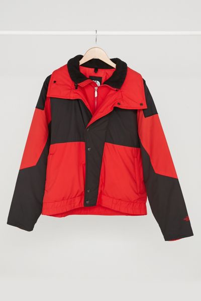 red and black north face jacket