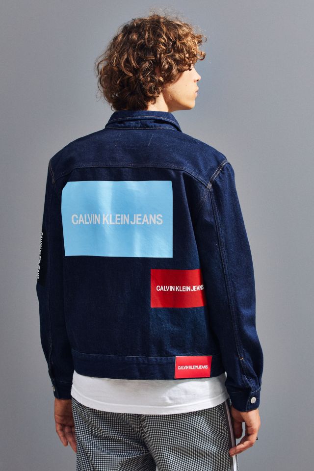 Calvin Klein Placed Logo Denim Trucker Jacket | Urban Outfitters