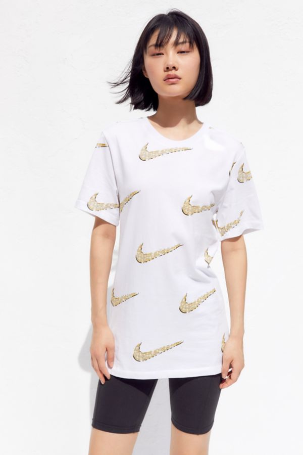 Nike Allover Print Shimmer Swoosh Tee | Urban Outfitters