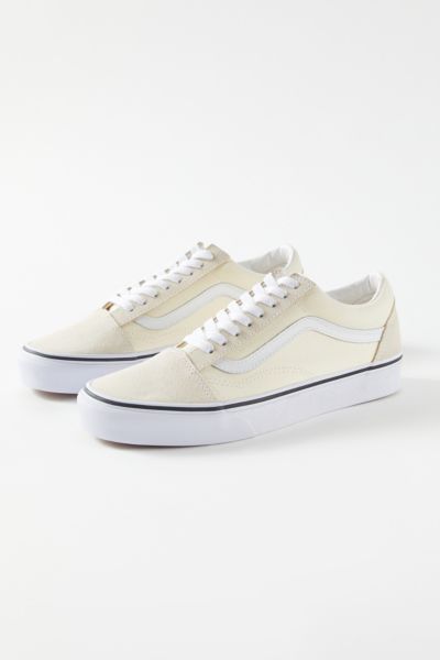 cream colored high top vans