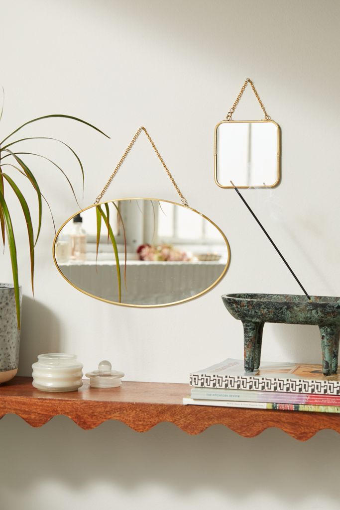 Oval hanging mirror
