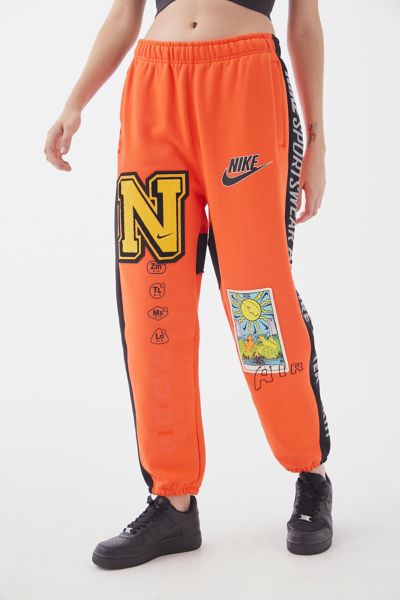 orange sweatpants nike