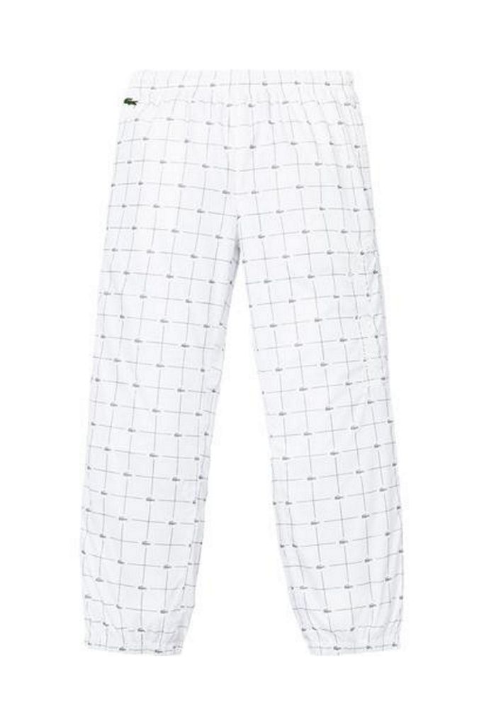 Supreme Lacoste Reflective Grid Nylon Track Pant | Urban Outfitters