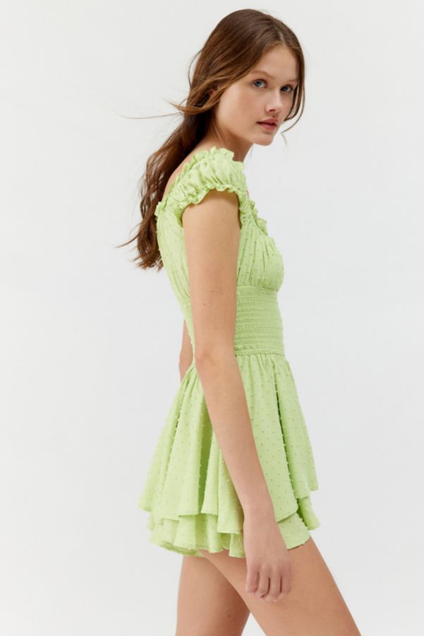 Slide View: 4: UO Rosie Smocked Tiered Capped Sleeve Ruffle Romper