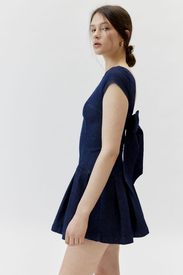 Slide View: 3: UO Bryan Bow-Back Pleated Denim Mini Dress