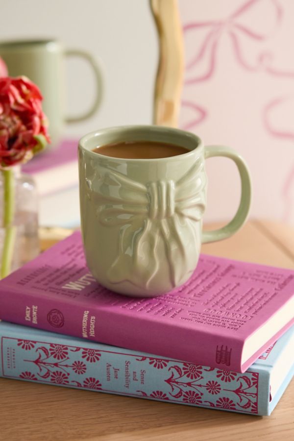 Slide View: 1: Sculpted Bow Mug