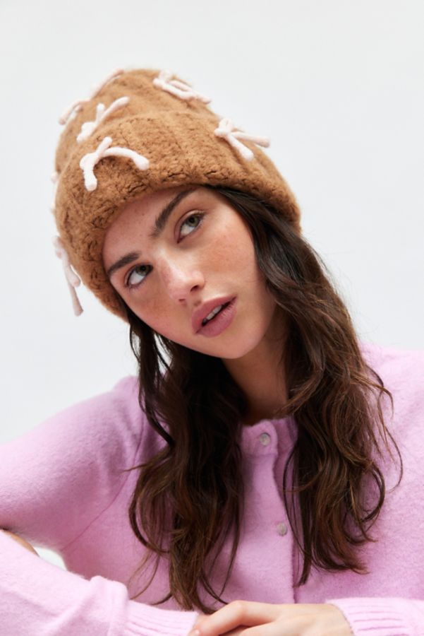 Slide View: 1: Tied With A Bow Ribbed Knit Beanie