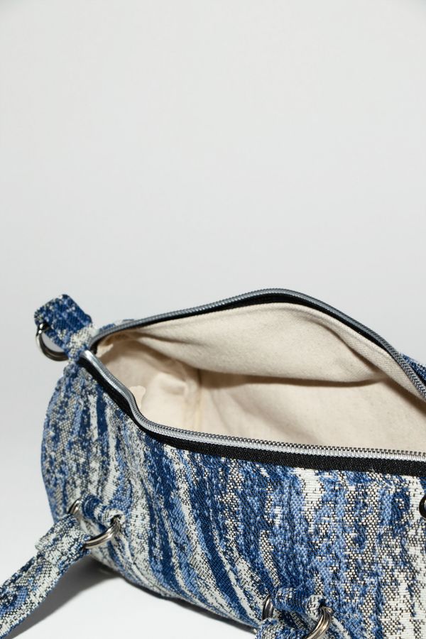 Slide View: 3: Bournestar Mini Patterned Denim Duffle Bag