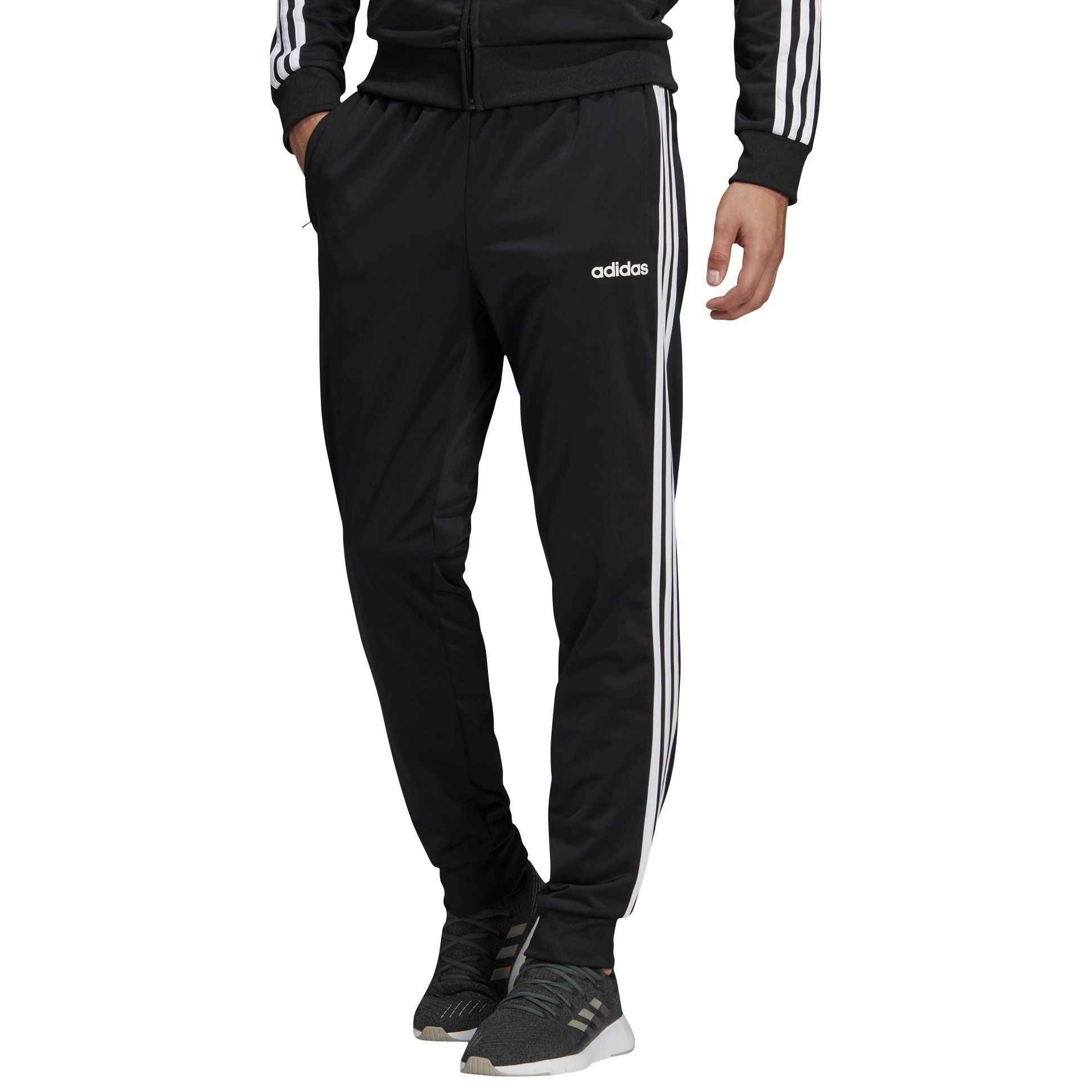 Штаны адидас мужские. Брюки мужские adidas Essentials 3-Stripes. Брюки мужские адидас Essentials черные. Зауженные брюки Essentials 3-Stripes. Adidas Essentials Tracksuits.