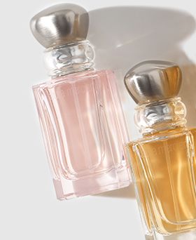 two bottles of laura mercier perfume